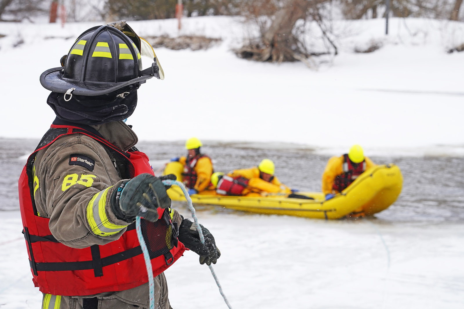 Image of a fire fighter performing an ice rescue