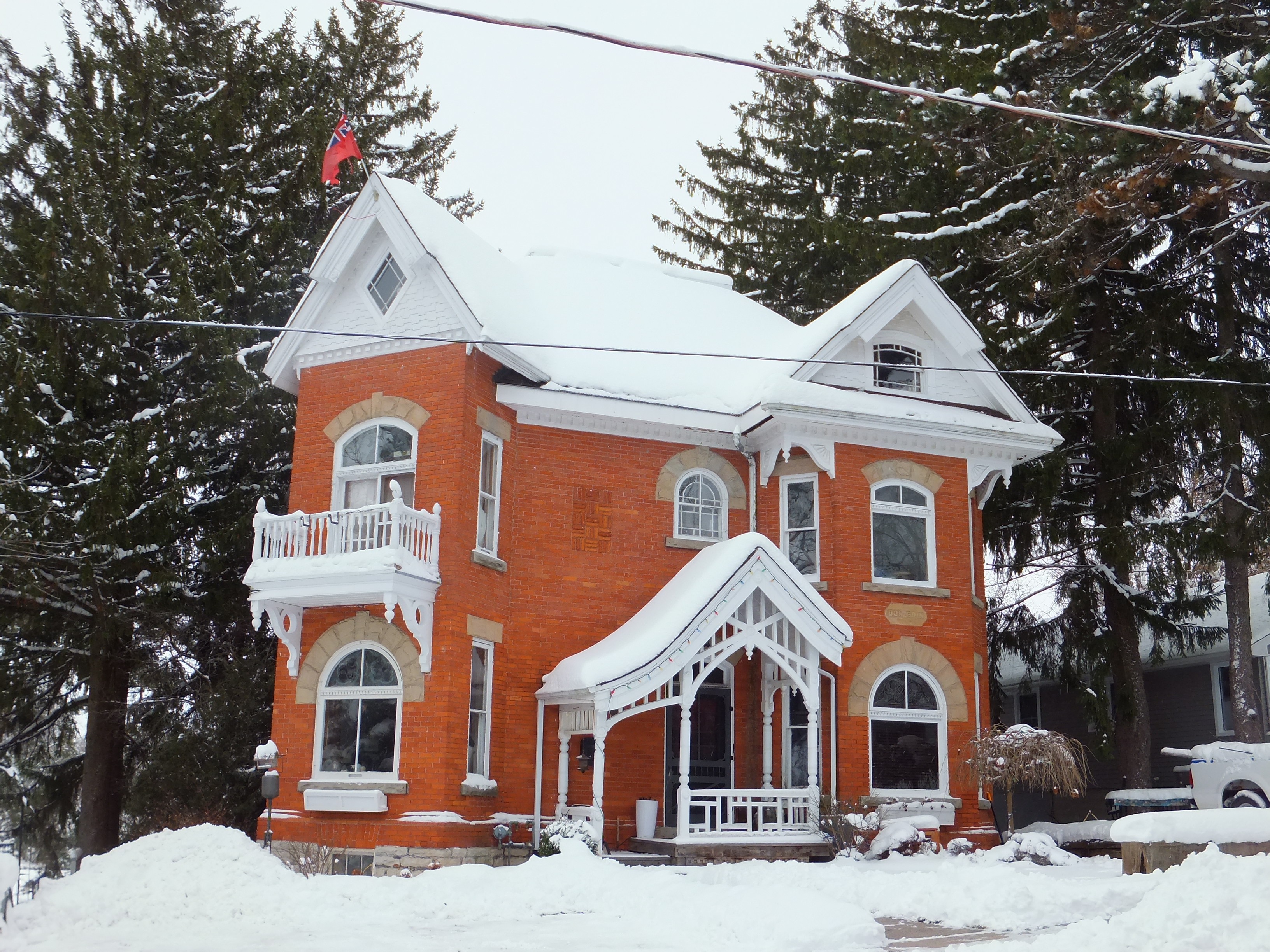 Orange red brick Queen Anne style house