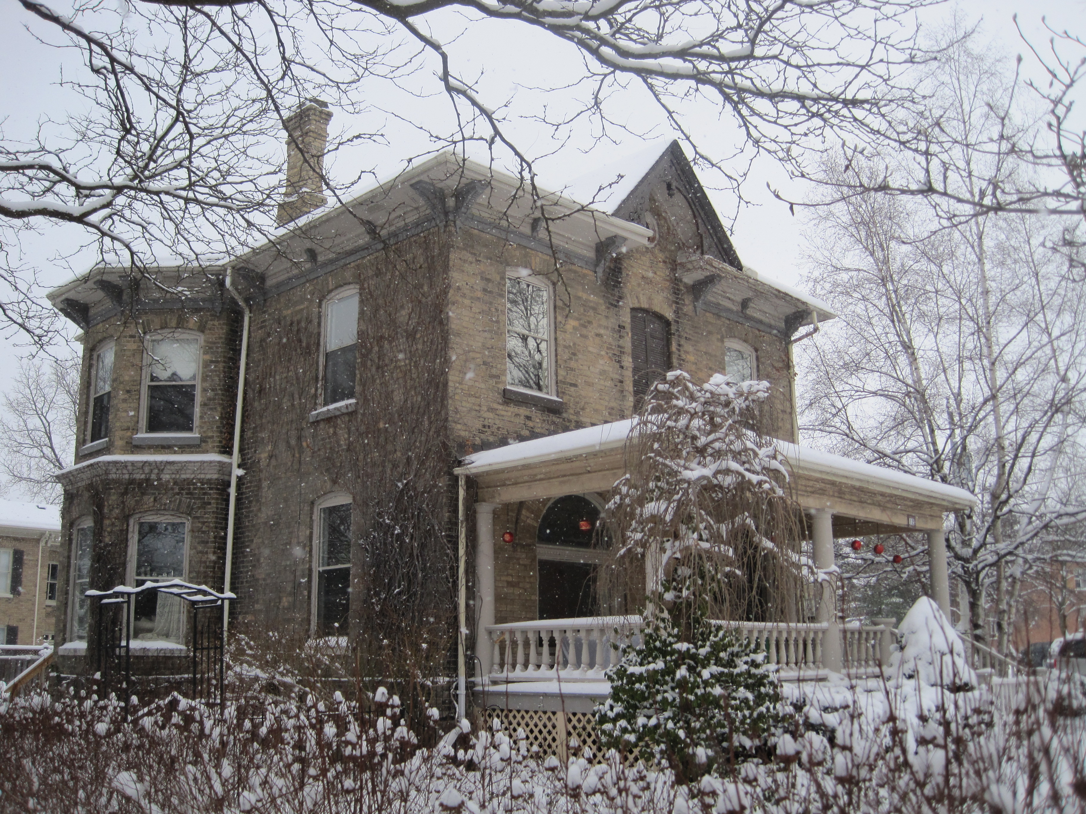 Yellow brick Italianate style house