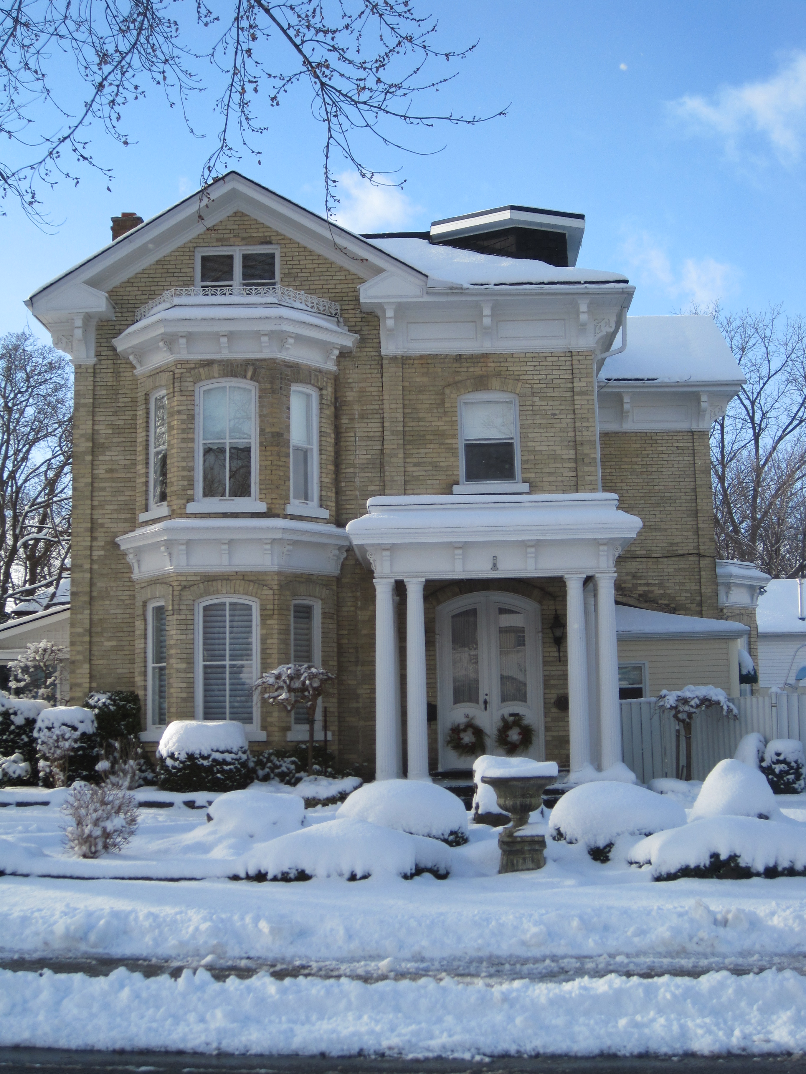 Yellow brick Italianate style house