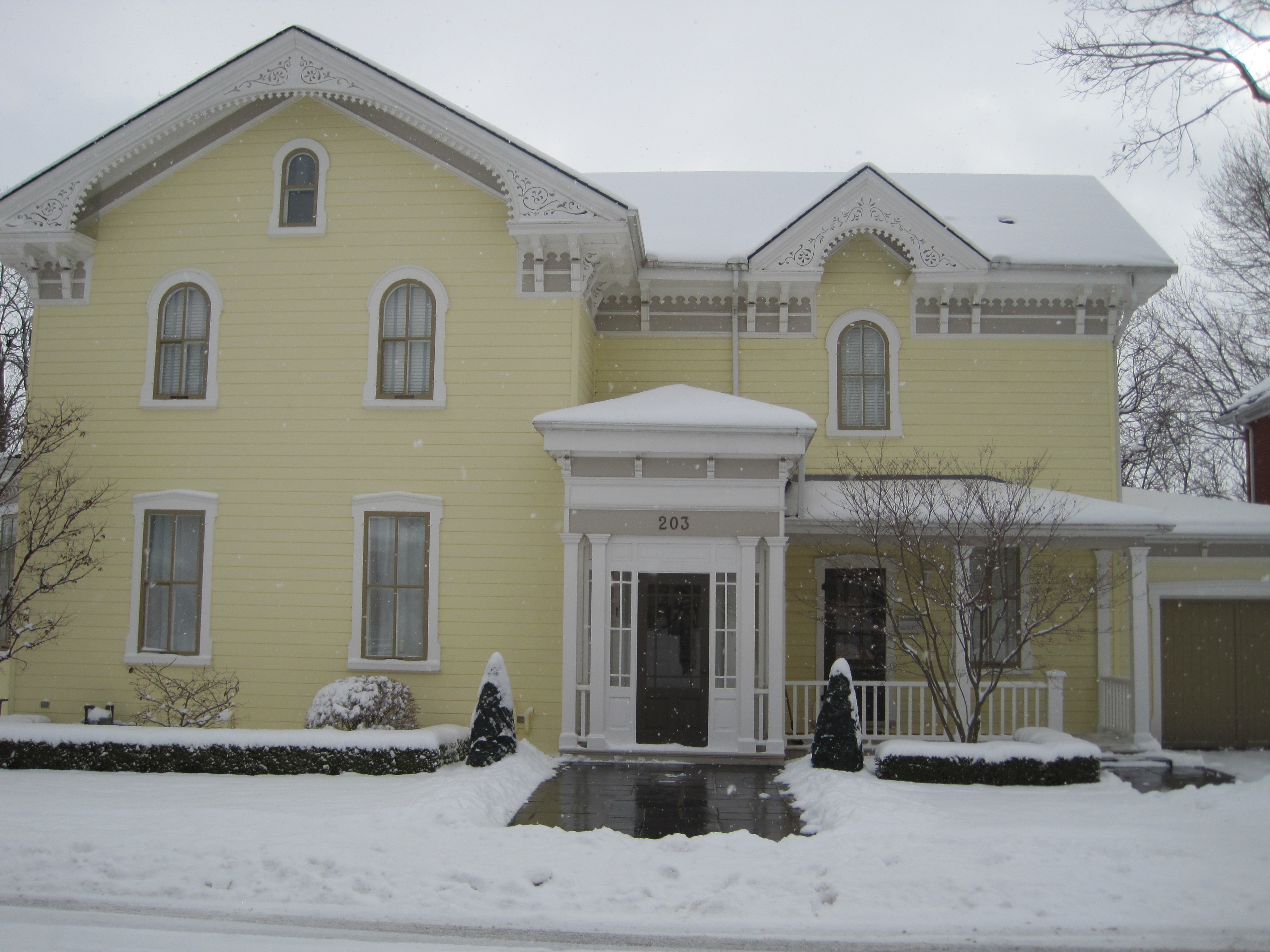 Yellow brick Italianate style house