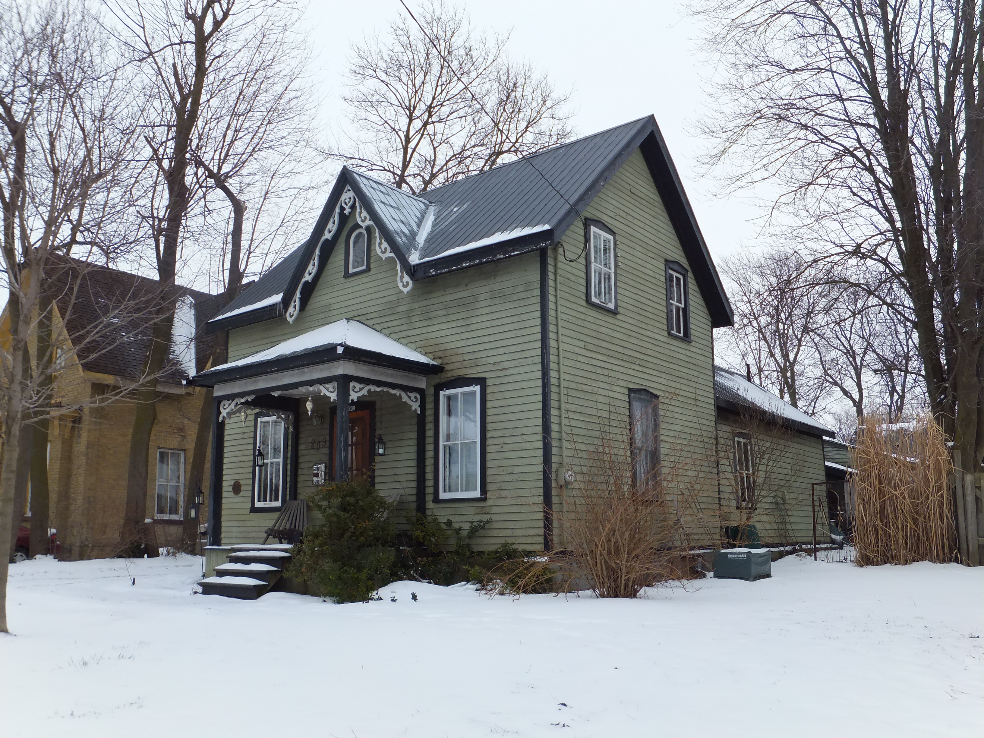 Clapboard Gothic Revival style house