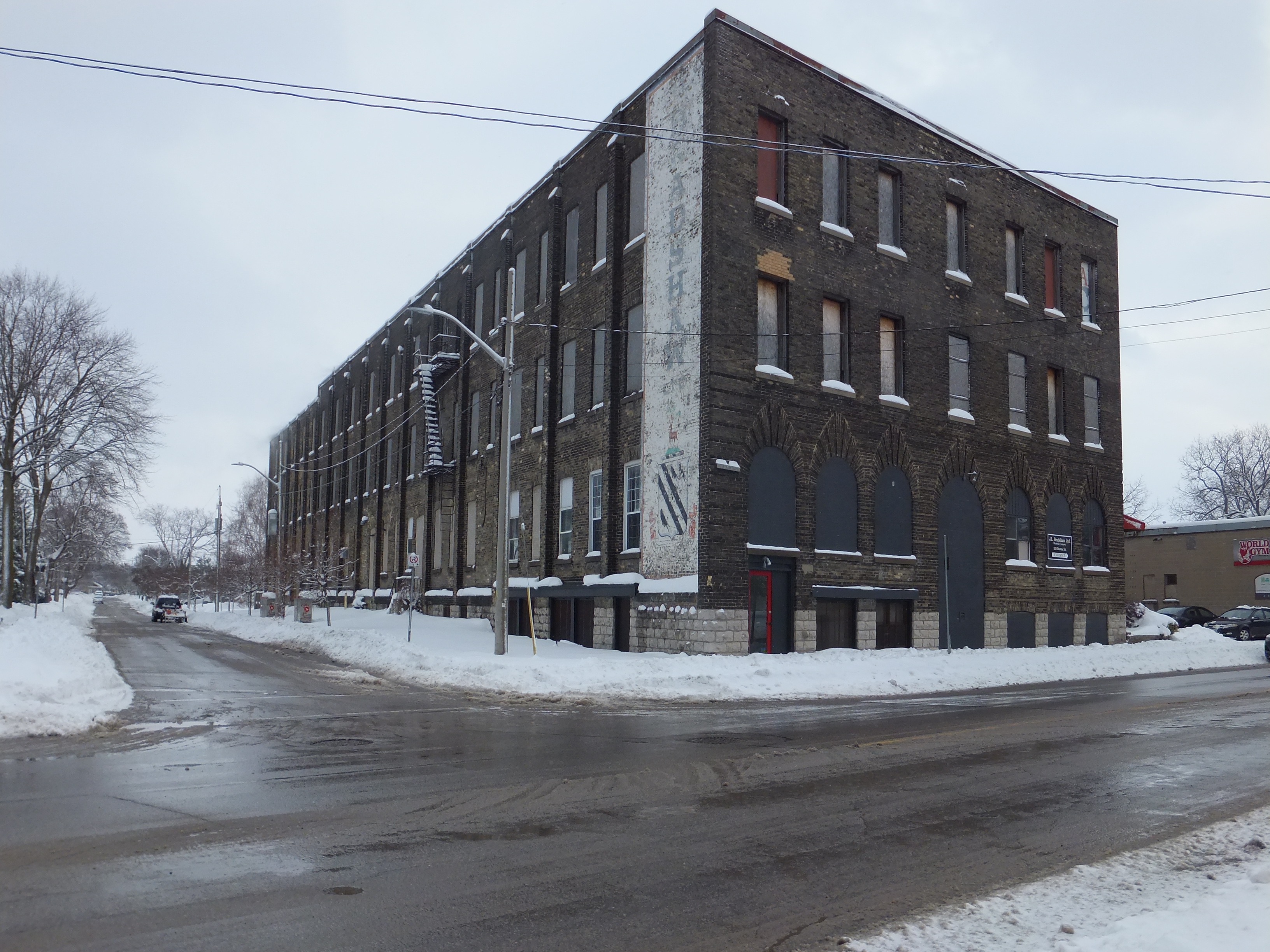 Three storey yellow brick Edwardian/Industrial style building