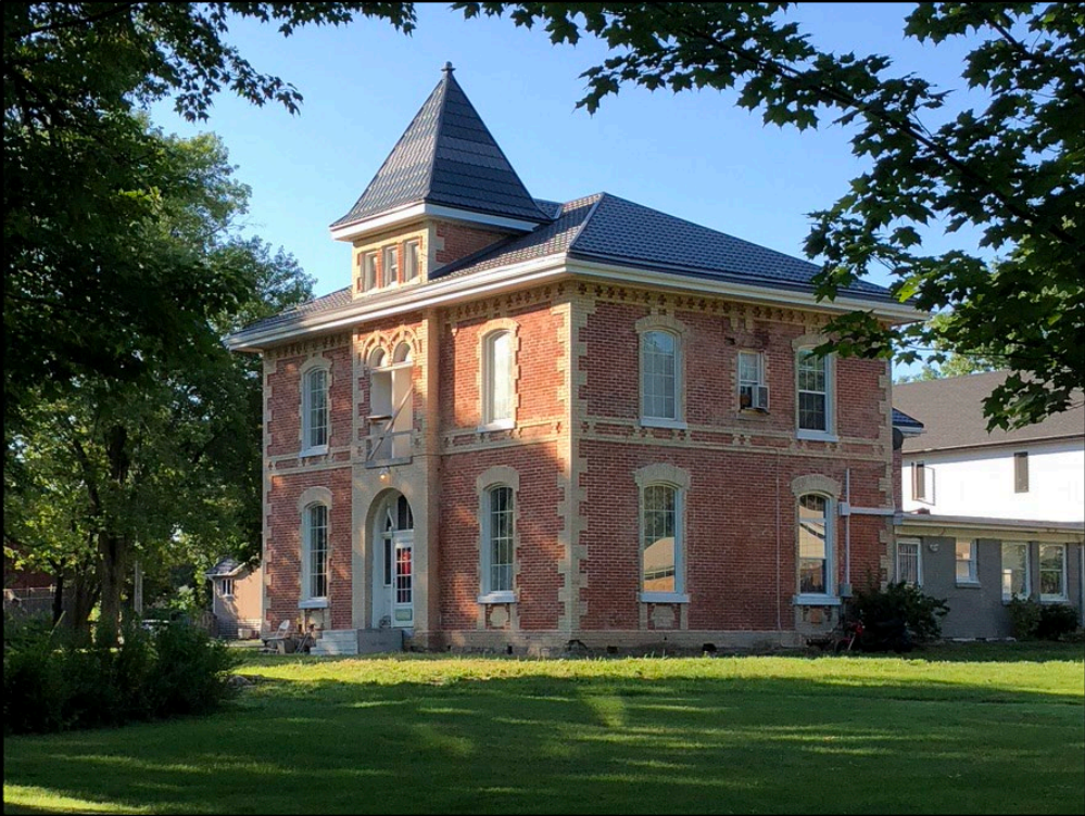 Red brick with yellow brick accents house