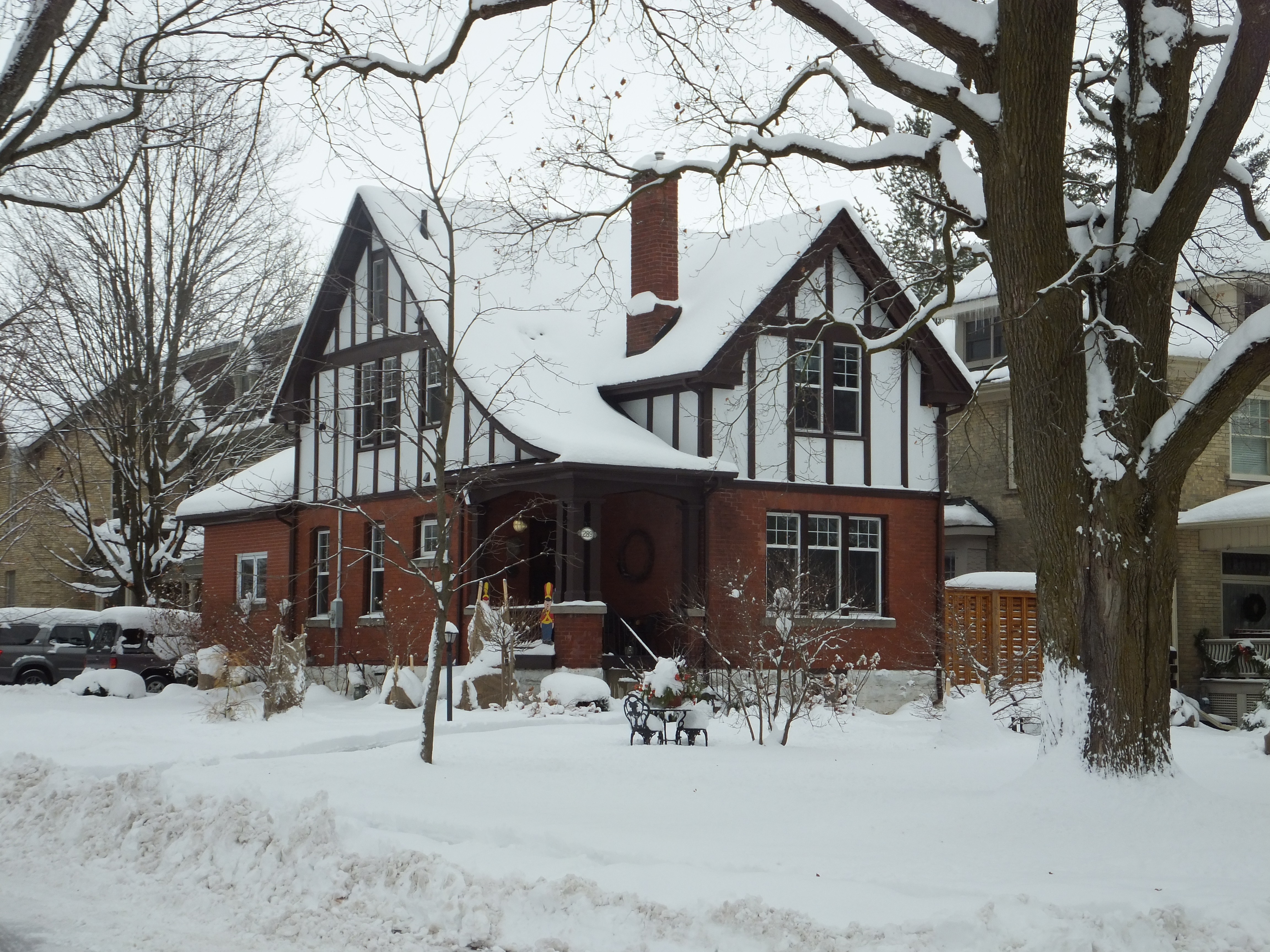 Brick, timber and stucco gabled Tudor Revival style house