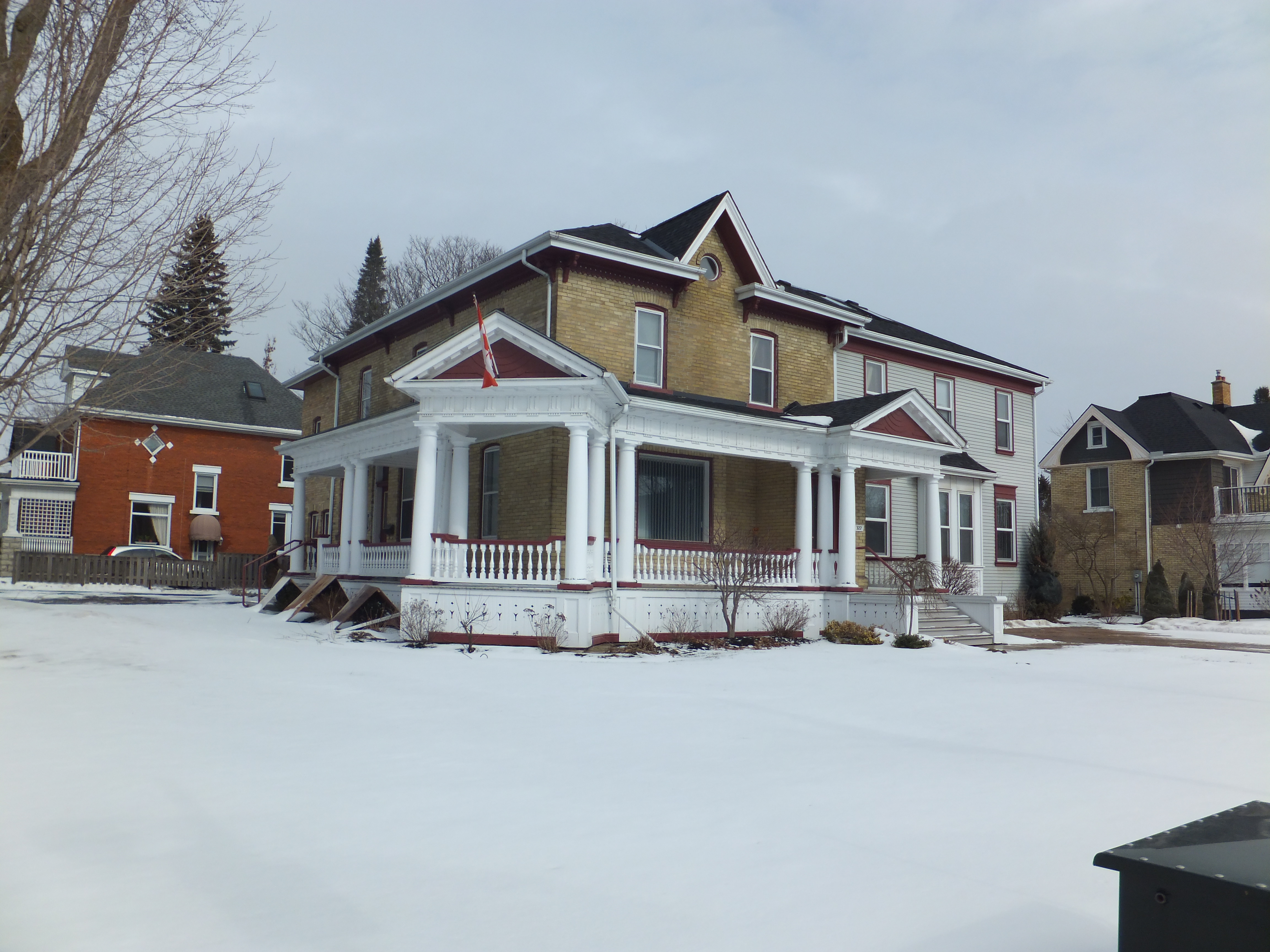 Yellow brick Italianate style house