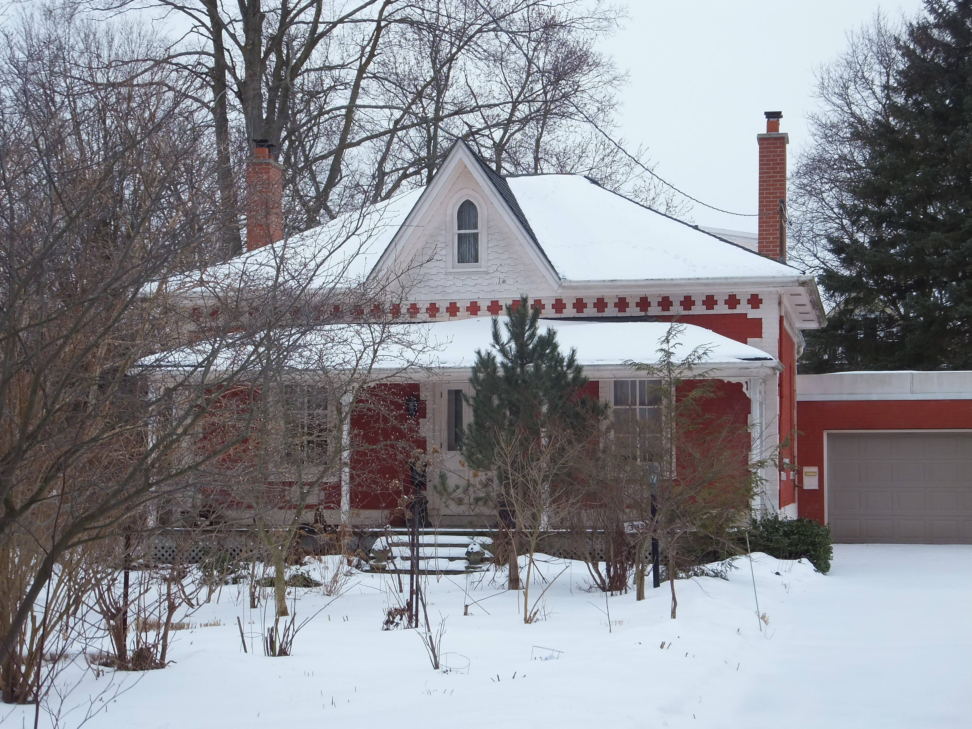 Red brick Ontario Cottage style house