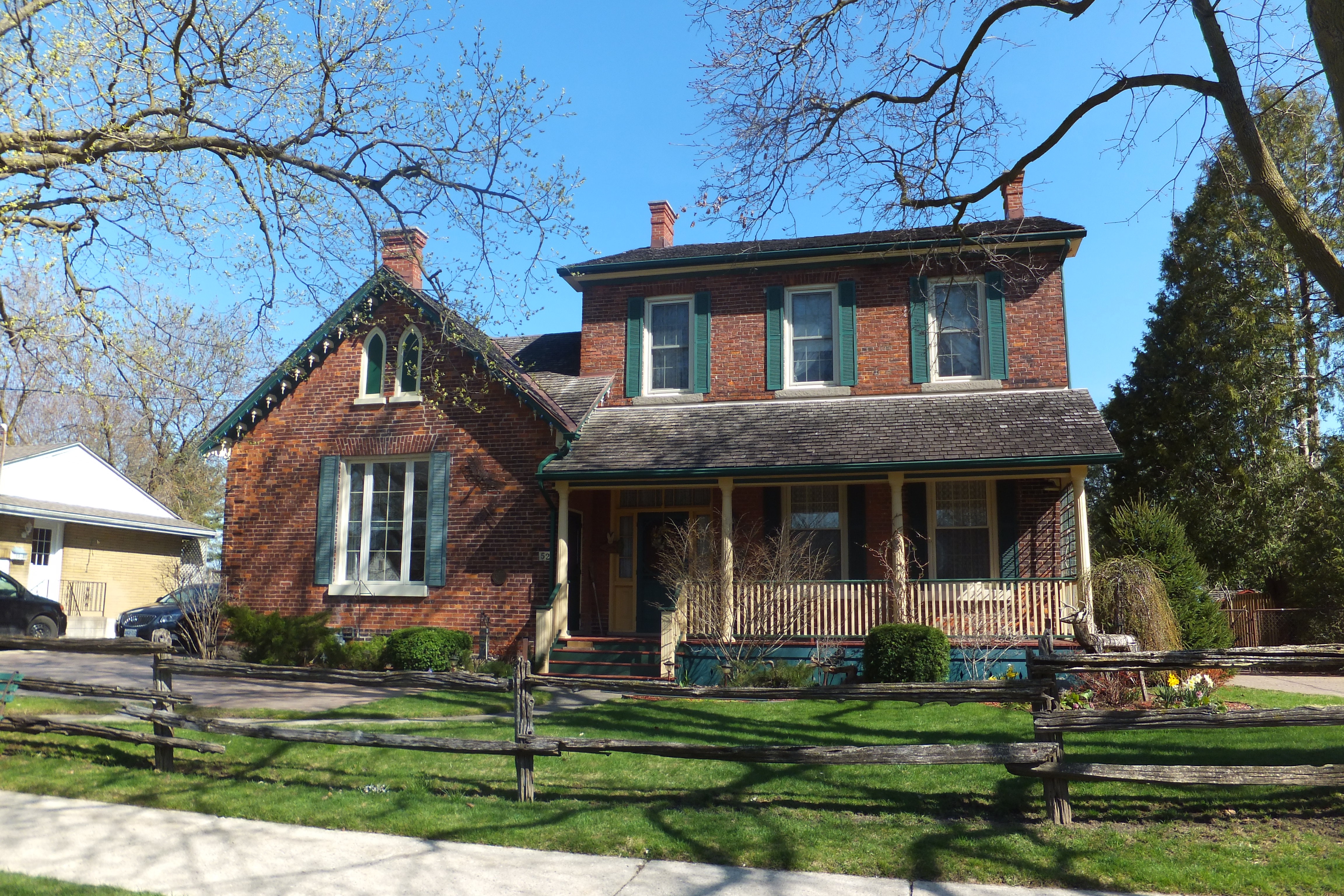 Red brick Georgian Gothic Revival style house