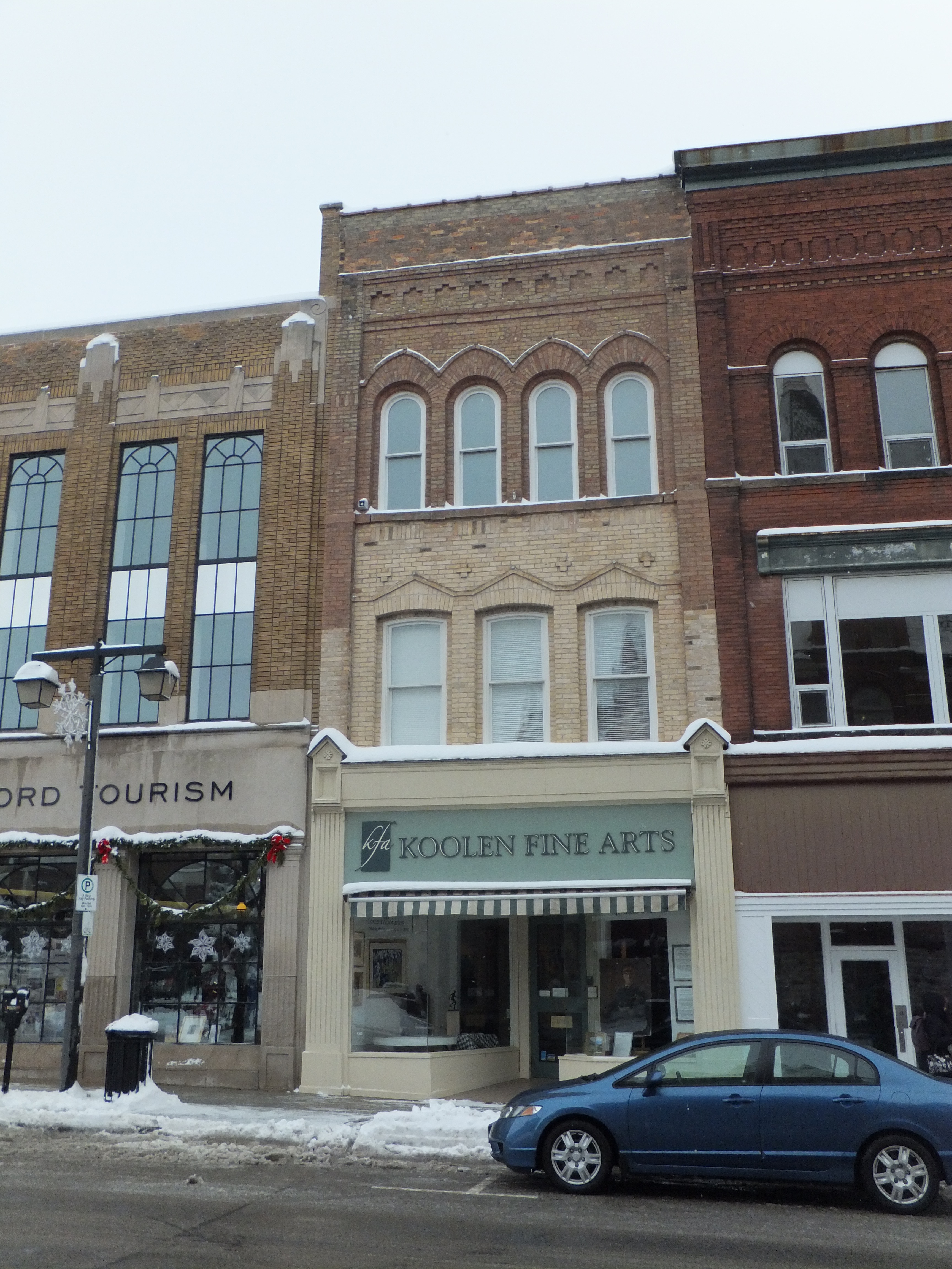 Brown and yellow brick Italianate/Queen Anne style building