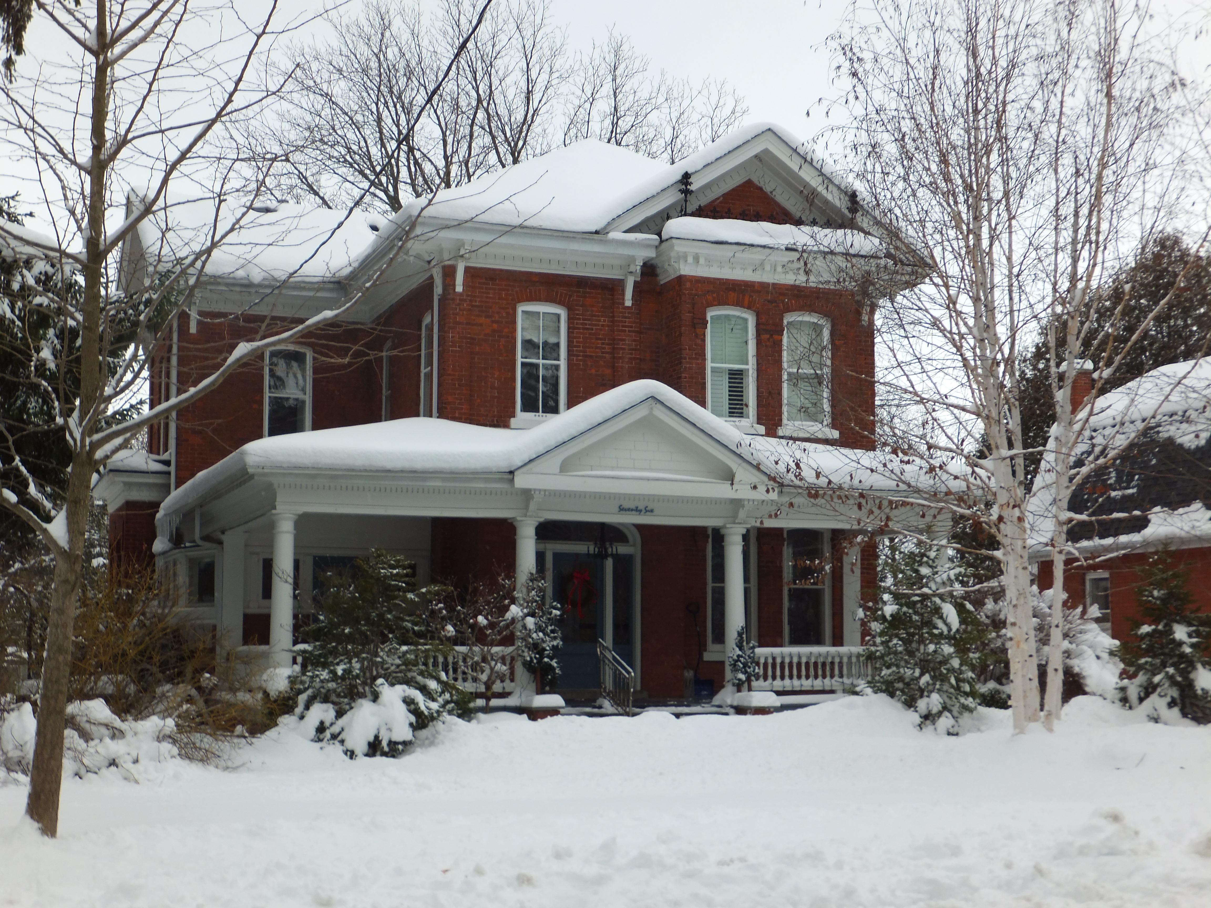 Red brick Italianate style house