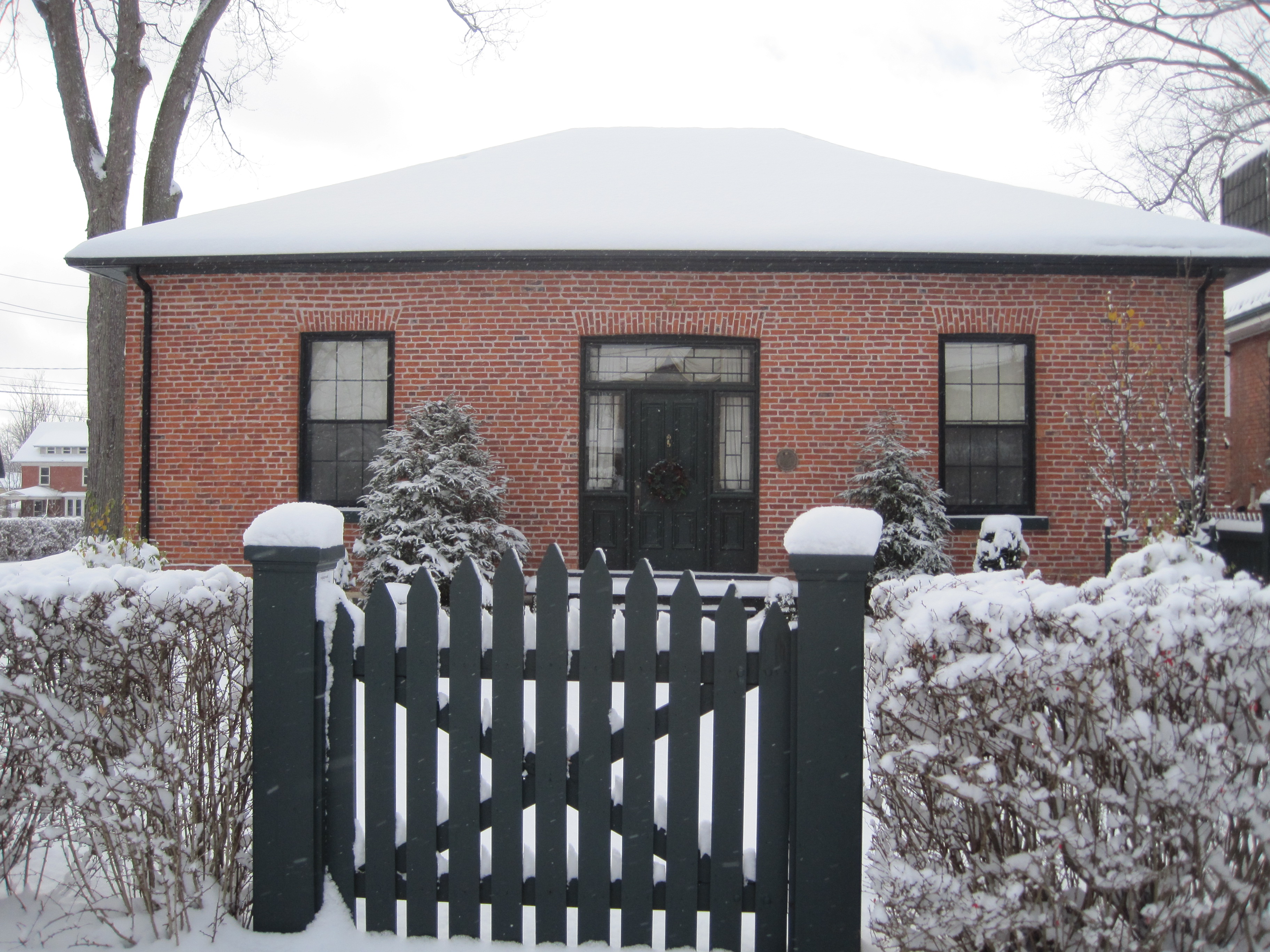 Red brick Ontario Cottage style house