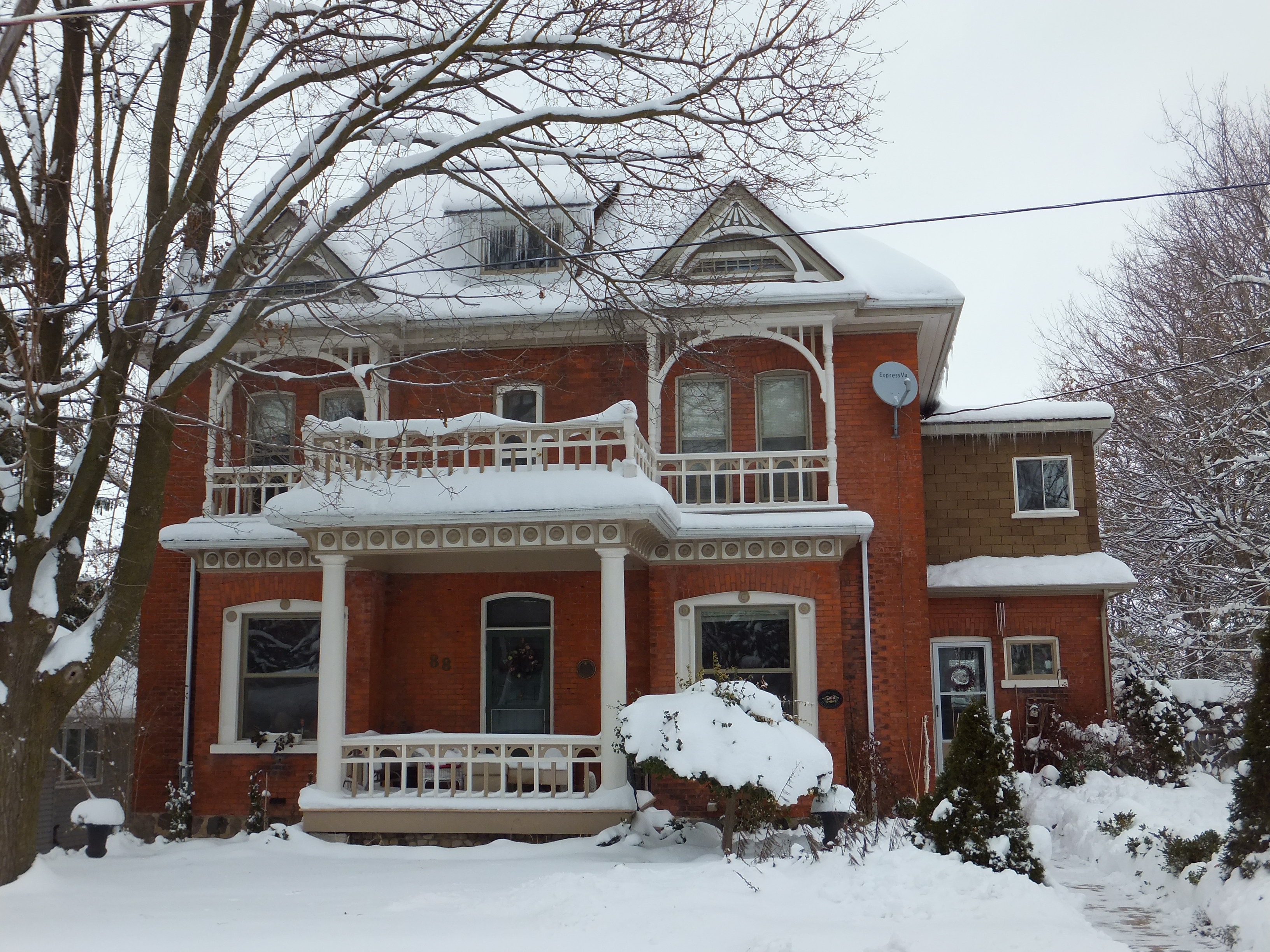 Red brick Queen Anne style house