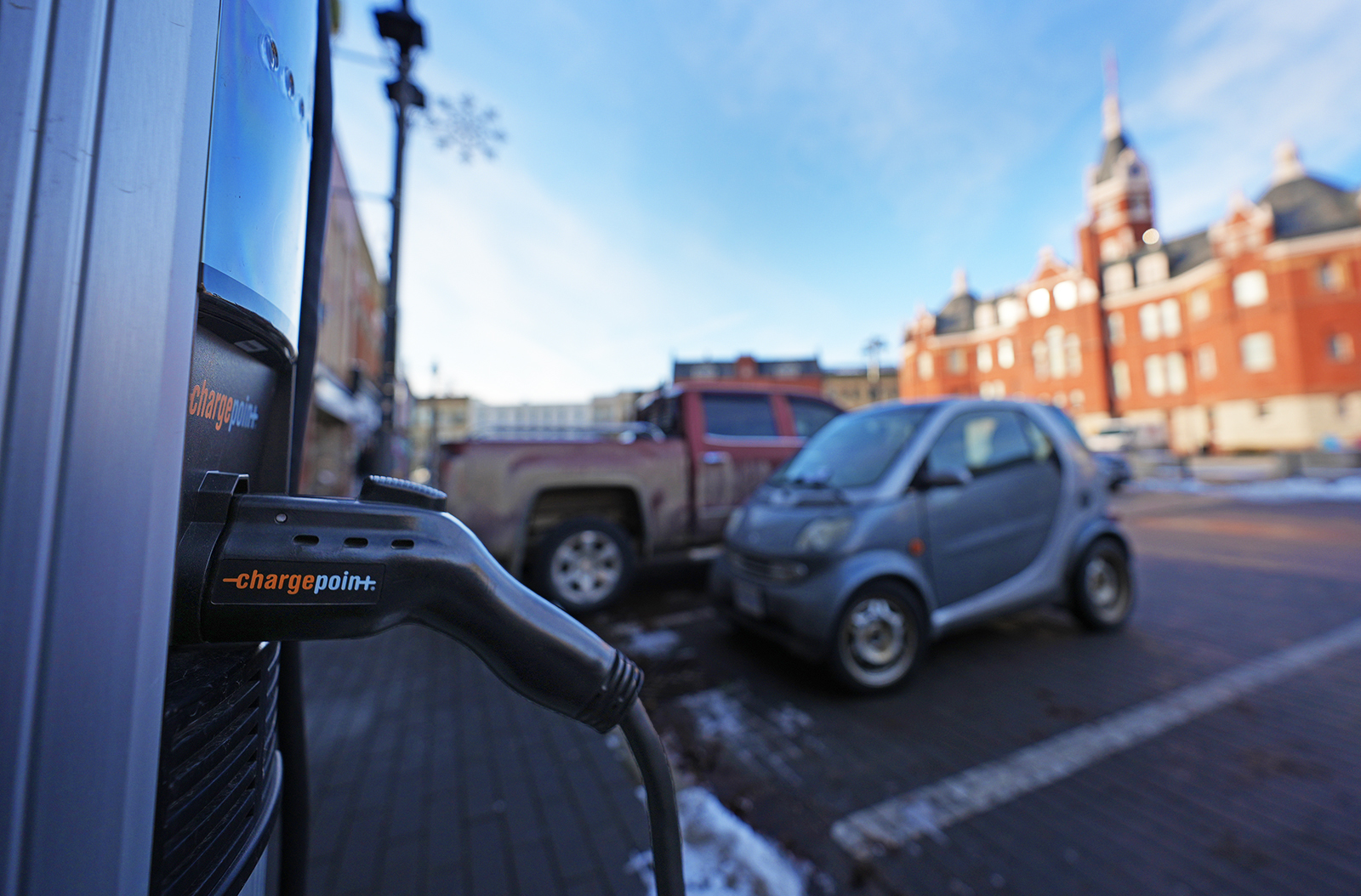 electric vehicle charging station in a parking lot