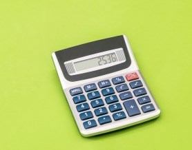 Calculator on a green background